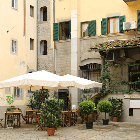 Soak up the atmosphere while sipping drinks in a local bar