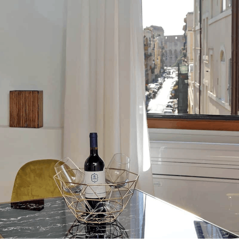 Share a bottle of wine before heading out for dinner