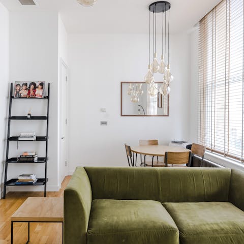 Kick back in the bright living room with a glass of wine after a day of London sightseeing
