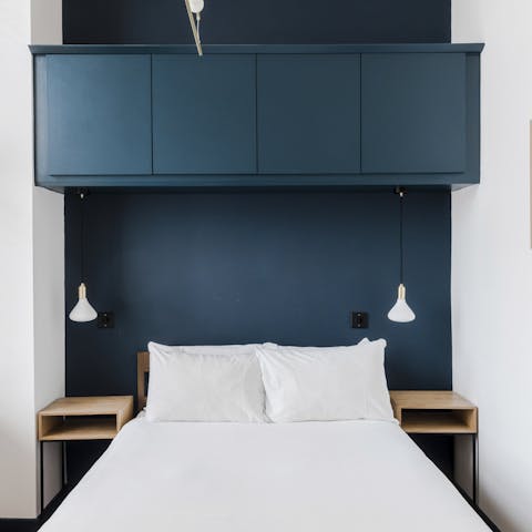 Wake up in the comfortable, minimalist bedroom feeling rested and ready for another day of exploring