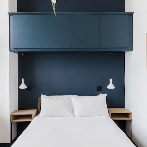 Wake up in the comfortable, minimalist bedroom feeling rested and ready for another day of exploring
