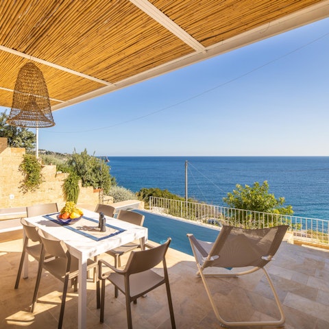 Savour views of the sea as you enjoy an alfresco carbonara