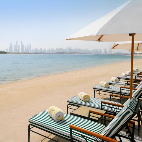 Stretch out on the resort's private beach