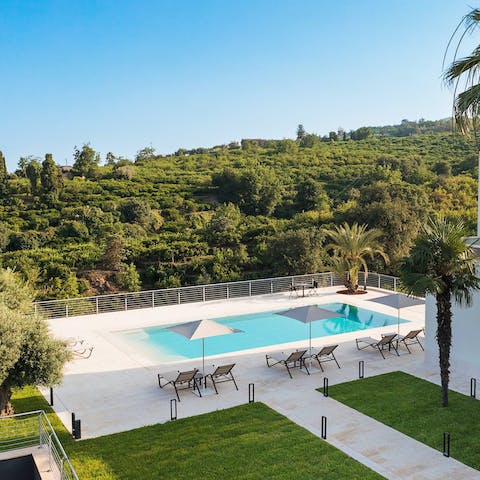 Feel a wonderful sense of relaxation while lounging by the pool