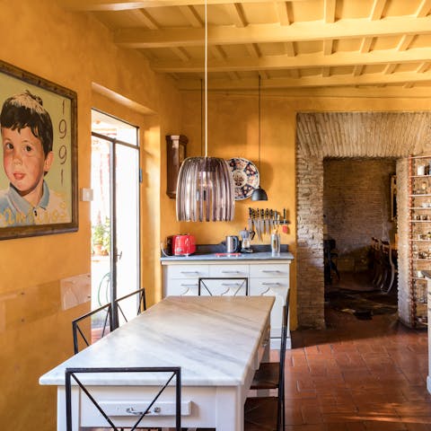 Enjoy breakfast at the marble-topped table