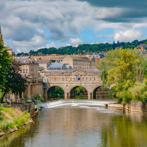 Walk ten minutes south and stroll across Pulteney Bridge