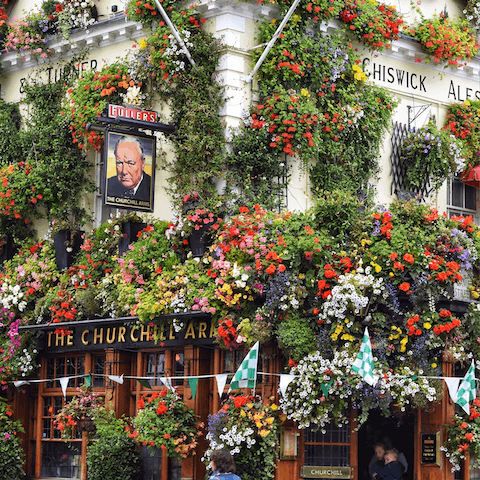Spend the afternoon in one of the charming pubs found in Notting Hill