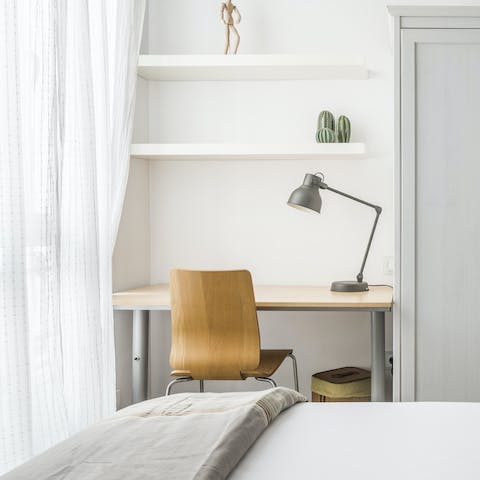 Catch up on work at the second bedroom's desk