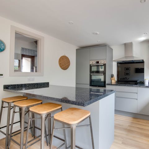 Enjoy coffee and biscuits around the kitchen island
