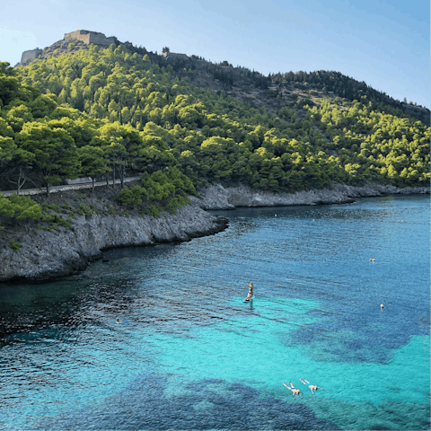 Swim and paddle in the crystal clear waters