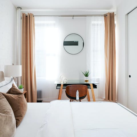 Set up for remote working at the desk in the bedroom