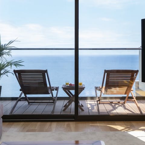 Enjoy evening drinks together in the cool sea breeze