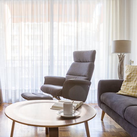 Get comfortable in the modern armchair with a good book
