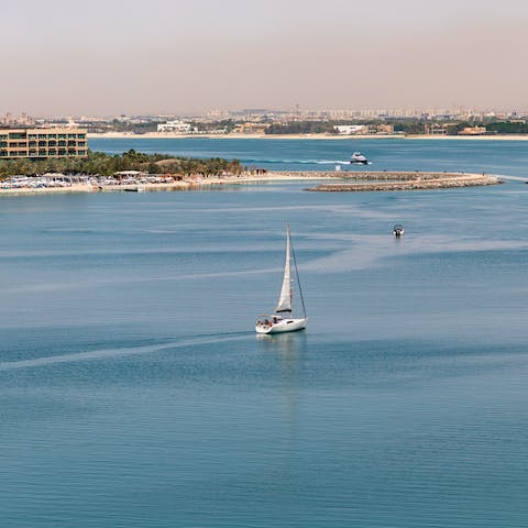 Take a boat tour around the Arabian Gulf
