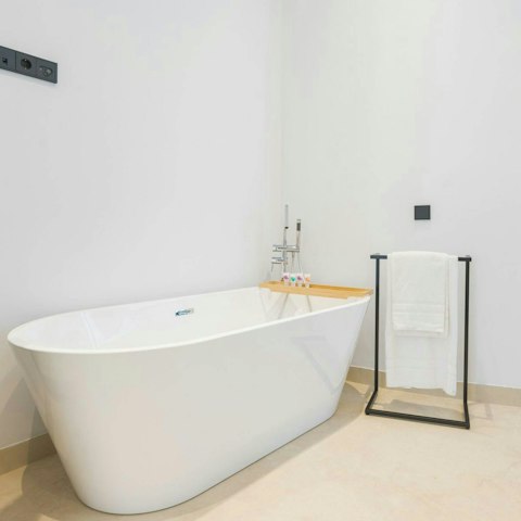 Wind down with a long soak in the bath tub