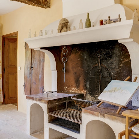 Light up the grand period fireplace and get toasty during the colder months