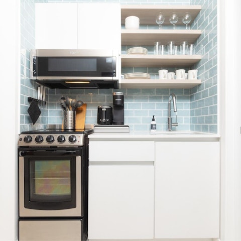 Cook up some fresh Floridian seafood in the pastel kitchen