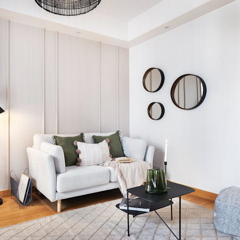 Sink into the serene sofa after a day exploring Paris