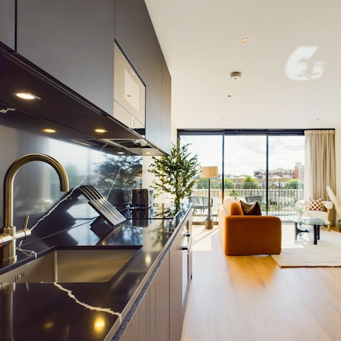 Cook up a feast in the sleek kitchen