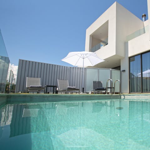 Feel the sunshine on your face as you reline on your poolside lounger