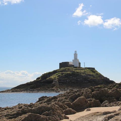 Wander along the seafront for half an hour until you reach Mumbles lighthouse