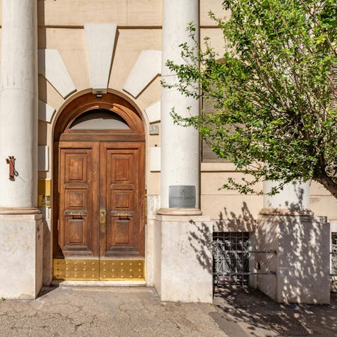 Don't forget to take a photo in front of the charming entrance to the apartment building