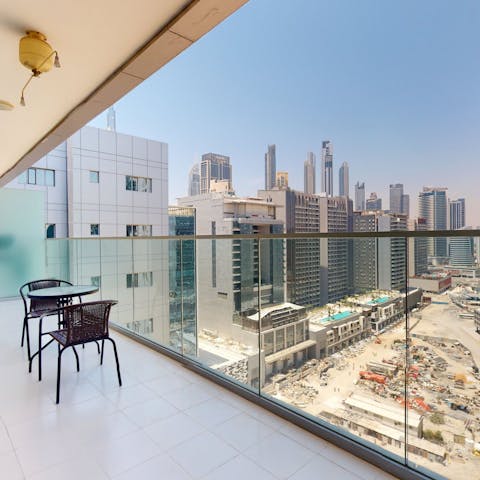 Enjoy a glass of karak tea out on the balcony