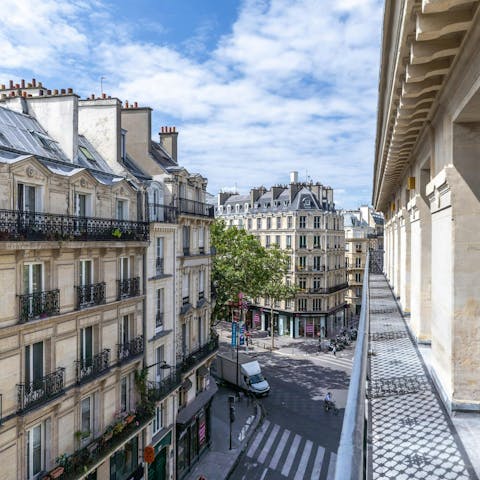 Admire the Parisian architecture from the balcony