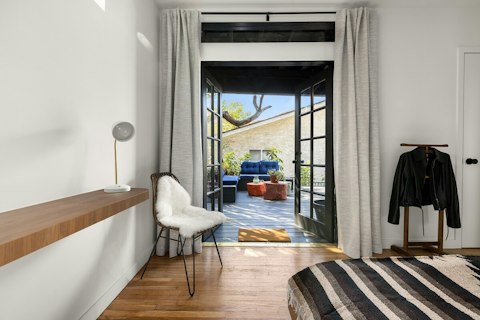 Step straight onto the sun-lit deck from your bedroom