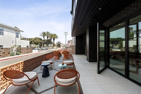 Catch the California breeze over palm-lined streets from your patio