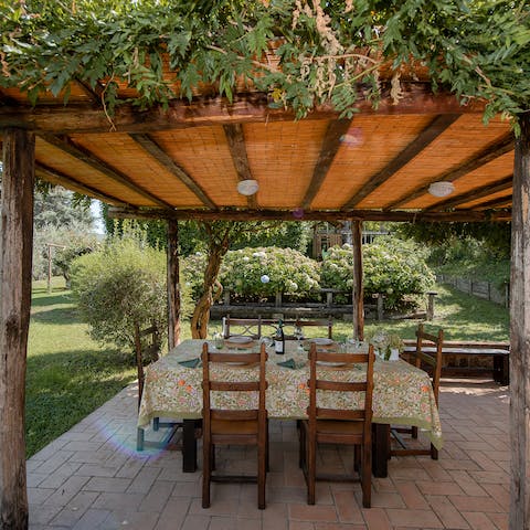 Enjoy breakfast al fresco in the shade of the shared garden