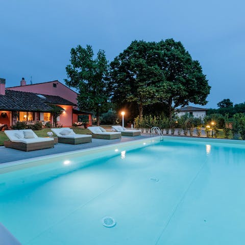 Enjoy a gentle swim at dusk in your private pool