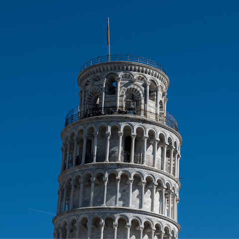Spend an afternoon exploring Pisa, a thirty-five-minute drive away