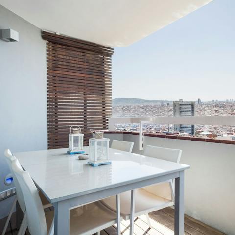 Sip on a glass of sangria as you drink in the city vistas