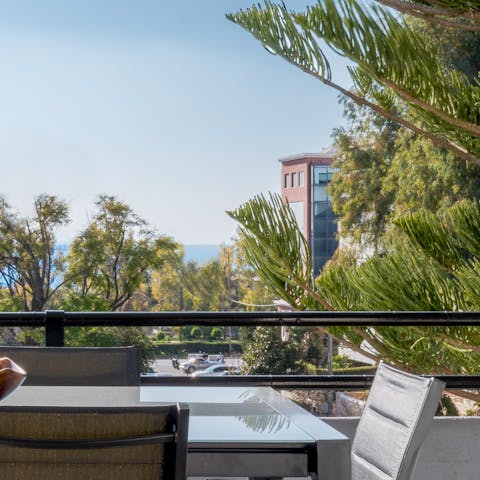 Enjoy relaxed times out on the huge balcony boasting partial sea views