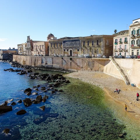 Jump in the car and drive over to the island of Ortigia