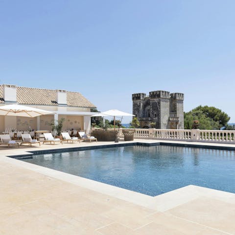 Spend your days relaxing around the private pool