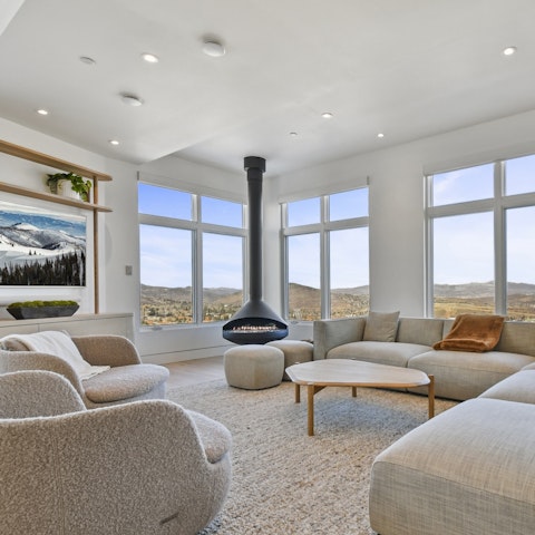 Savour the views while relaxing by the fire