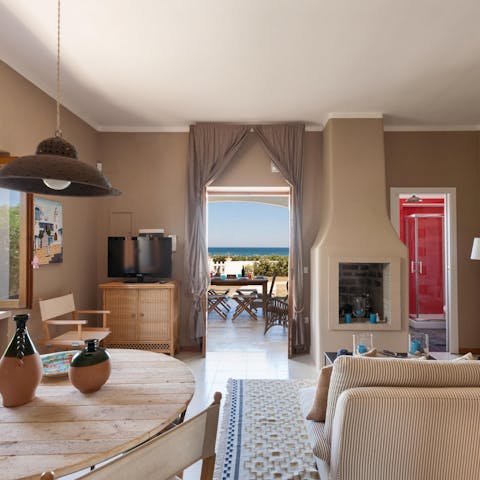 Admire the coastal view from the inside and the outside