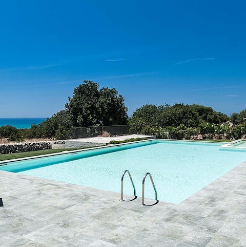 Plunge into the sparkling swimming pool on hot afternoons
