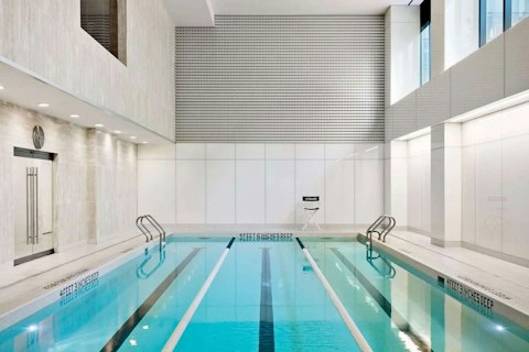 Swim morning laps in the shared indoor pool