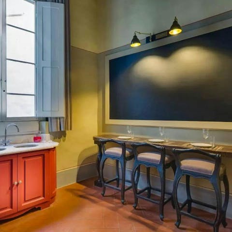 Serve drinks and cocktails in the dedicated bar area