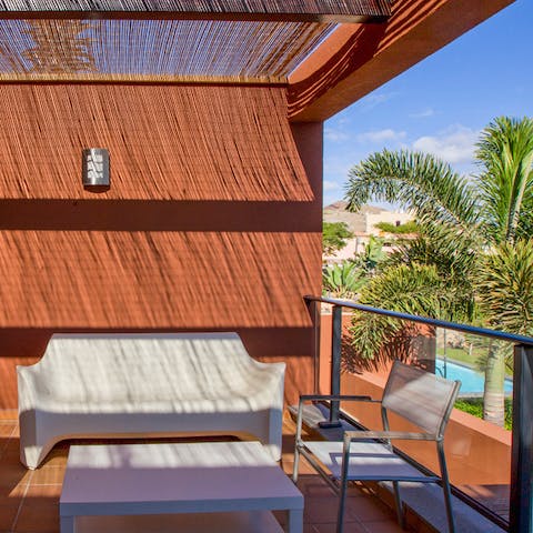 Have a drink on the first-floor balcony