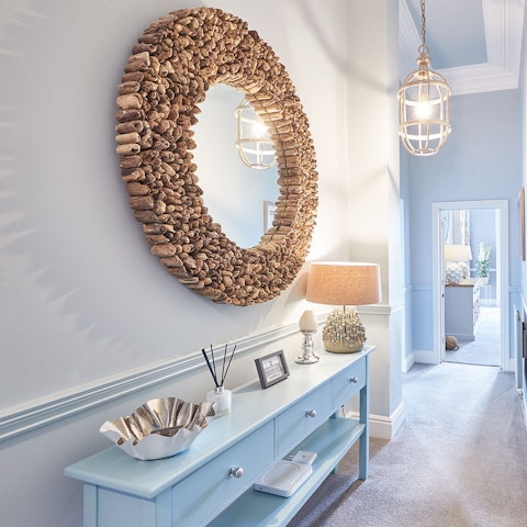 Admire the original decorations throughout this tasteful home