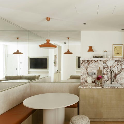 Enjoy a simple supper in this compact kitchen's cosy nook