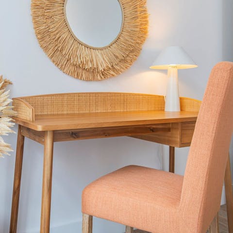 Sit down at your charming workspace and spend some time journaling or catching up on emails