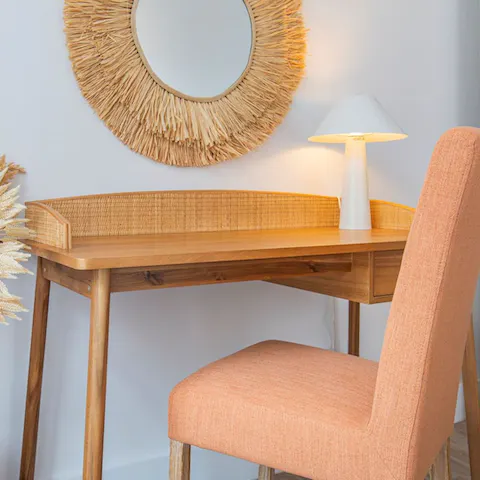 Sit down at your charming workspace and spend some time journaling or catching up on emails