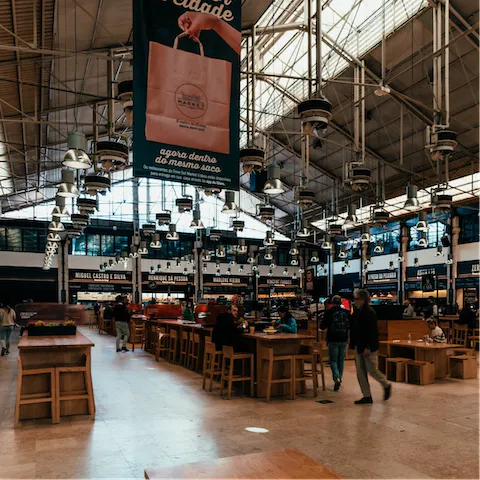 Discover the delicious array of street food at Time Out Market, a short walk away