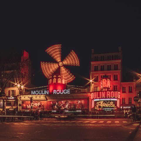 Stroll to the iconic Moulin Rouge, 12 minutes from this home