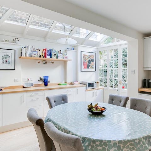 Come together for lazy breakfasts in the sun-filled kitchen